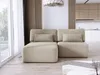 A modern living room with a beige sectional sofa and a kitchen area in the background. Náhled obrázku produktu
