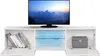 A white TV stand with a television on top and various items inside its compartments. Produktbild-Vorschau