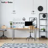 A modern home office setup with a wooden desk, computer, chairs, and shelving unit. Voir les images du produit