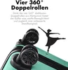 Close-up of suitcase wheels with marketing text and a silhouette of a dancer. Produktbild-Vorschau