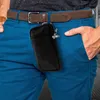 A person wearing blue pants and a brown belt, with a black pouch attached to the belt. Produktbild-Vorschau