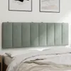 A headboard made of padded panels is mounted on a wall above a bed. Anteprima dell’immagine prodotto