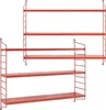 Two red modular wall shelf units are shown against a white background. Anteprima dell’immagine prodotto