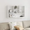 A white wall-mounted shelf unit filled with decorative items. Voir les images du produit