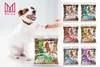 A dog is shown next to a bag of dog treats, with multiple other bags of dog treats displayed in the background. Produktbild-Vorschau