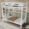 A white bunk bed with shelves for books and toys, set up in a child's room. Produktbild-Vorschau