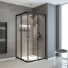 A modern bathroom with a black framed glass shower enclosure. Produktbild-Vorschau