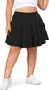 A woman wearing a black tennis skirt and white sneakers, shown from the waist down against a white background. Produktbild-Vorschau