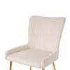 A close-up view of a beige upholstered chair with gold legs, isolated on a white background. Podgląd zdjęcia produktu