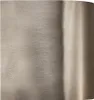 A close-up view of a brushed metal surface, likely a wall light fixture. Anteprima dell’immagine prodotto