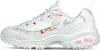 A side view of a white Skechers sneaker with a floral pattern. Produktbild-Vorschau