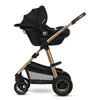 A black and gold Lionelo Amber 3-in-1 combi stroller with a car seat attached, shown from the side against a white background. Produktbild-Vorschau
