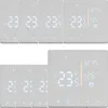 A collage of digital thermostats, some showing a digital display with temperature and time. Náhľad obrázku produktu