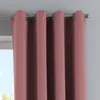 Close-up of pink curtains hanging from a curtain rod. Produktbild-Vorschau
