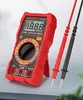 A red digital multimeter with probes, displayed on a light gray surface. Podgląd zdjęcia produktu