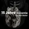 Close-up of a juicer motor with text overlay stating "15 Jahre Garantie auf den Motor" (15 Year Warranty on the Motor). Produktbild-Vorschau