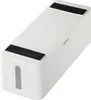 A white cable management box with black anti-slip pads on top. Náhľad obrázku produktu
