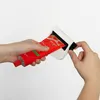 Hands using a tube squeezer to extract product from a red tube. Produktbild-Vorschau