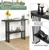 A narrow console table with a marble-like finish and a black metal frame, shown in a room setting with decorative items. Insets highlight specific features. Produktbild-Vorschau