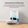 A robotic vacuum cleaner docked at its charging and self-emptying station. Voir les images du produit