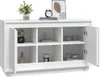 A white sideboard with multiple compartments, some of which are open and display decorative items. One door is ajar. Náhľad obrázku produktu