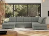 A U-shaped sofa is shown in a modern living room setting with a large window overlooking trees. Produktbild-Vorschau