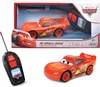 A collage of images showing a Disney Pixar Cars 3 Lightning McQueen RC toy car in its packaging, a separate toy car, and a remote control. Anteprima dell’immagine prodotto