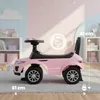 A pink ride-on car for children in a nursery or playroom setting. Produktbild-Vorschau