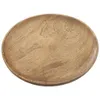A round wooden serving tray on a white background. Voir les images du produit