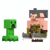 Two Minecraft Legends figures, a Creeper and a Piglin Brute, are shown against a white background. Náhled obrázku produktu