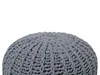 A close-up view of a gray knitted pouf on a white background. Náhled obrázku produktu