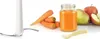 A food processor attachment, carrots, a jar of juice, and fruit are arranged on a white background. Voir les images du produit