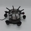 A fondue set is displayed against a plain white background. Produktbild-Vorschau