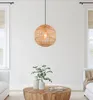 A living room scene with a pendant light, coffee table, and seating. Produktbild-Vorschau