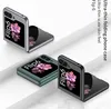 Three folding phone cases are displayed in different colors on a white and gray surface. Náhled obrázku produktu