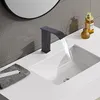 A modern bathroom sink with a black waterfall faucet. Podgląd zdjęcia produktu