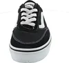 A front view of a black Vans sneaker with white laces and a white side stripe, set against a white background. Náhled obrázku produktu