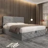 A bedroom scene featuring a bed. Náhľad obrázku produktu