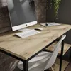 A modern home office desk setup with a computer, keyboard, mouse, and a chair. Náhľad obrázku produktu