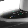 A close-up view of the control panel of an appliance, likely an iron, showing various colored indicator lights and symbols. Voir les images du produit