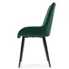 A side view of a green velvet dining chair with black legs, isolated on a white background. Produktbild-Vorschau