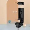 A close-up of a black selfie stick holder with measurement indicators. Voir les images du produit