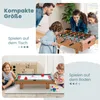 A collage showing a family playing foosball and two children playing air hockey and other games on the floor. Produktbild-Vorschau