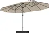 A double patio umbrella with a black pole and base, and beige canopy, shown against a white background. Náhled obrázku produktu