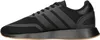 A side view of a black Adidas athletic shoe. Produktbild-Vorschau