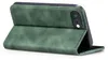 A green flip cover case for a smartphone, shown from the back with the cover open. Produktbild-Vorschau