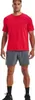 A man wearing a red t-shirt and gray shorts, standing against a white background. Náhľad obrázku produktu