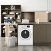 A Bauknecht washing machine is shown in a modern laundry room setting, next to shelves and cabinets. Produktbild-Vorschau