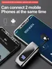A close-up marketing image showing a Bluetooth headset and two smartphones, highlighting its compatibility and ability to connect to two devices simultaneously. Produktbild-Vorschau