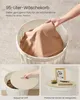 A collage showing a laundry basket with a hand placing laundry inside, a close-up of the lid being opened, and the lid used as a side table with decorative items. Produktbild-Vorschau